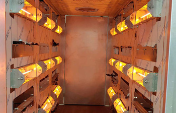 с обеих сторон печи полимеризации туннельного типа установлены нагревательные элементы