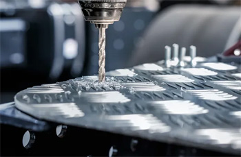 сверление металлических листов с нанесенным рифлением